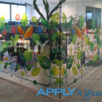 Transparent window film for the office with a bespoke cut-to-shape design with branding elements
