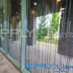 transparent window film with custom line design apartment building